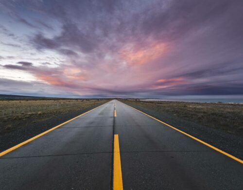 empty-paved-road-at-sunset-in-the-chilean-patagonia-royalty-free-image-1591901619