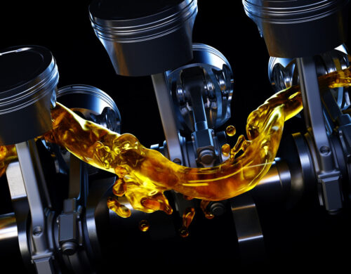 3d illustration of car engine with lubricant oil on repairing. Concept of lubricate motor oil