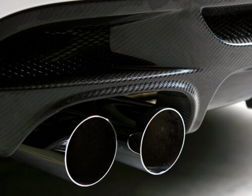 white car on black background