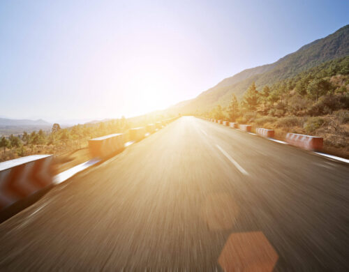 road-with-vanishing-point-sunset
